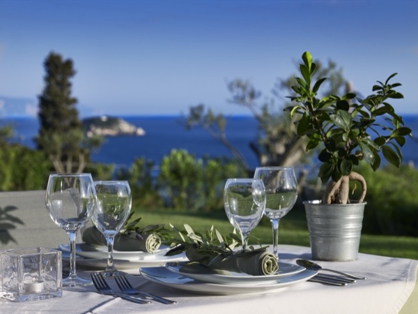 Elegant table setting with olive branch decoration
